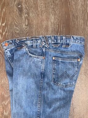 Wrangler x STAUD collab long wide leg boot cut in a classic medium wash 28 x 34
